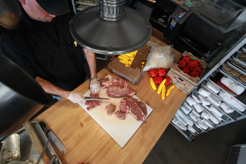 chef preparing food in kitchen