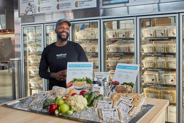 just food for dogs director of product innovation, justin p. standing in the jffd chicago kitchen